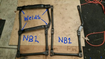 NB1 and 2 OEM chassis braces.jpg